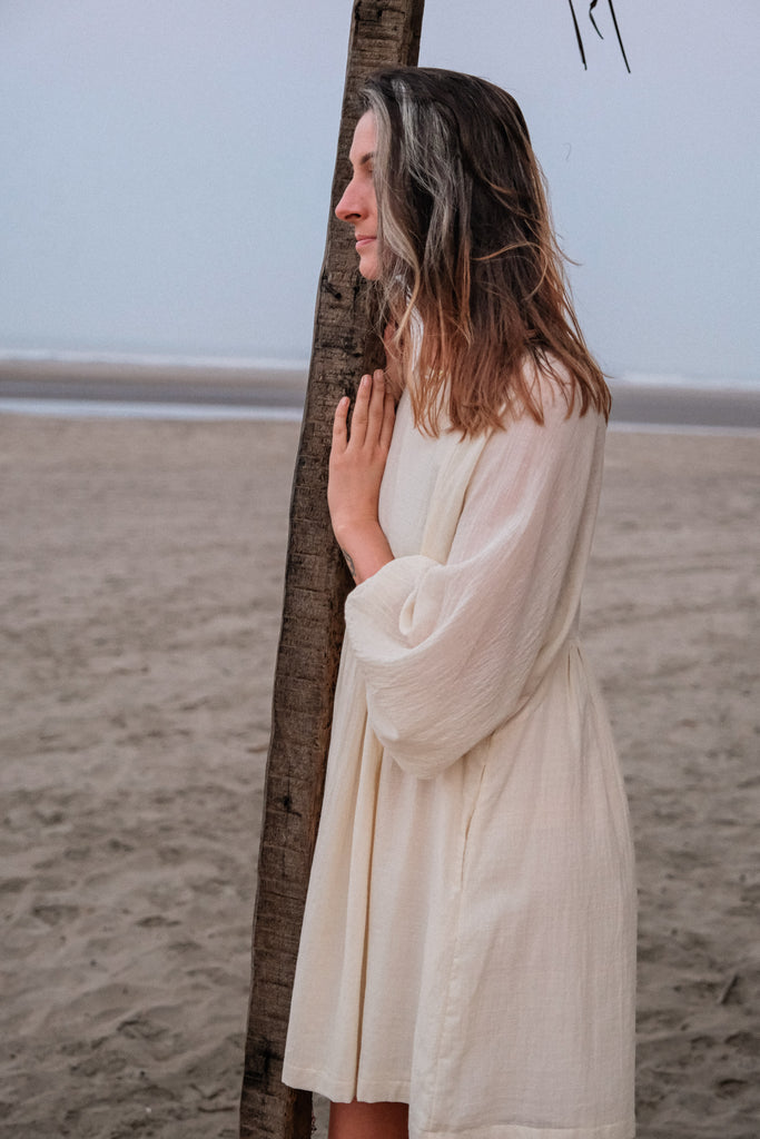 Romantic dress, day at a beach waering world of crow, Erica Kim in collaboration with World of Crow, White color dress, sustainable clothing