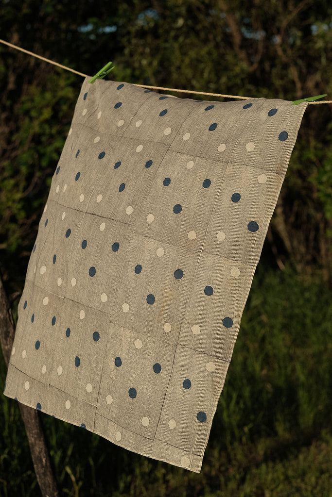 White bandana with scattered blue dot pattern by World of Crow - vintage cotton handkerchief for head wrap and styling.