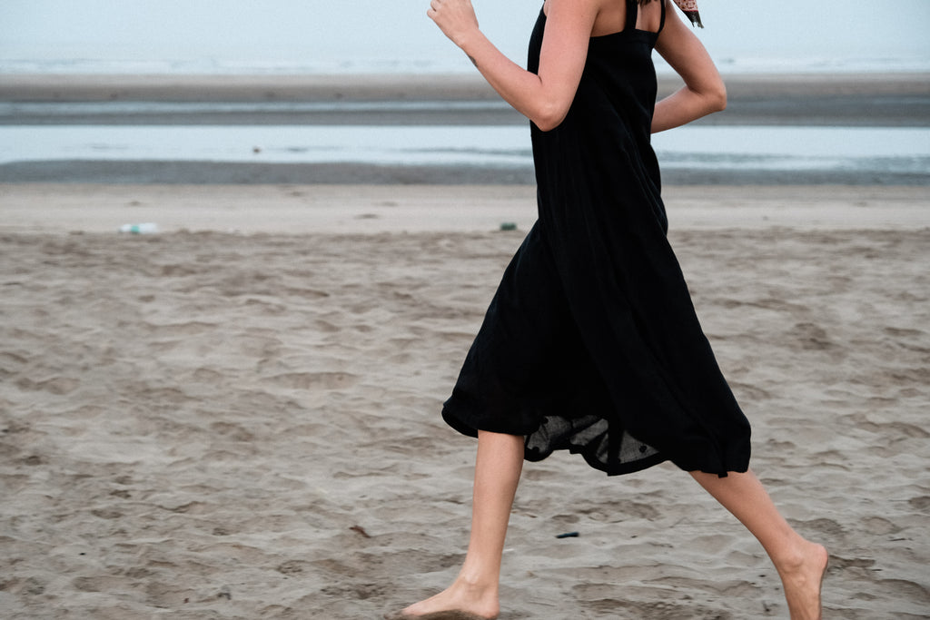 This Everywhere dress is made in collaboration between Erica Kim and World of Crow, it's sleeveless, black in color, Jamdani fabric, Midi length, Sustainably made