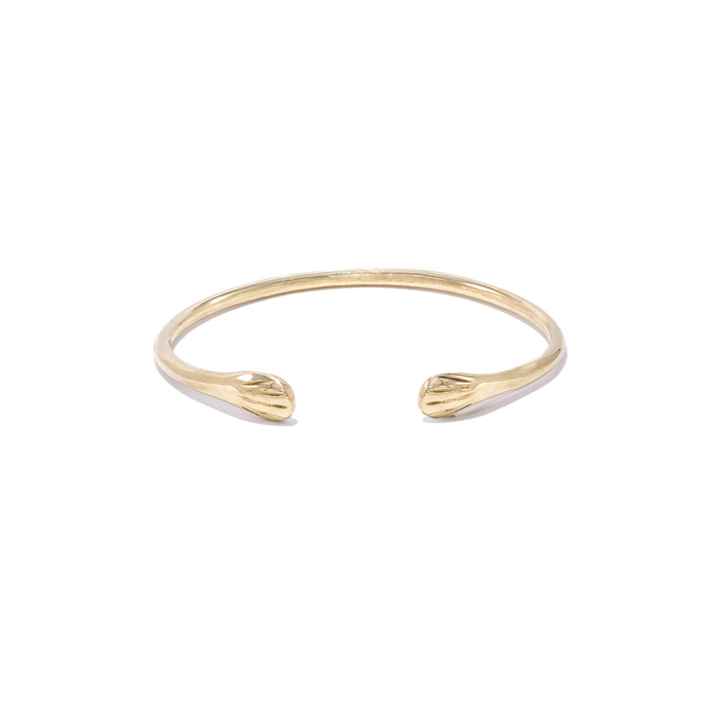 Introducing our hand-casted gold cuff bracelet, crafted from seapods gathered along the North Fork LI shores. Made from sustainable recycled brass, this bracelet is available in sizes S and M/L. Each piece supports marine habitat restoration, reflecting a commitment to both elegance and environmental stewardship.