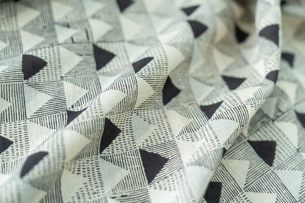 close-up of the skirt featuring the triangular hand-block print and the soothing natural dyes. 