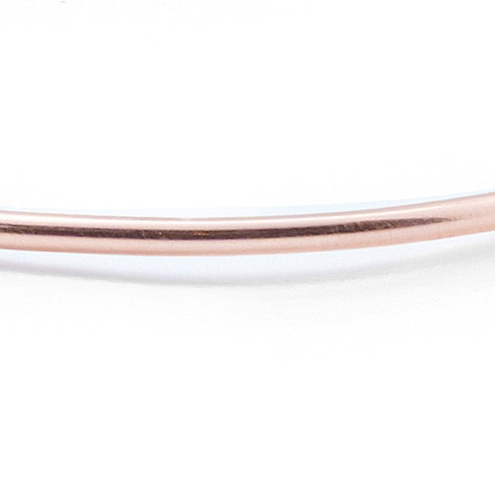 Introducing a beautifully crafted rose gold cuff bracelet, designed with two delicate wires. Available in both smooth and hammered finishes, this elegant piece is offered in sizes ranging from X-Small to Large, with custom sizing options to ensure a perfect fit.