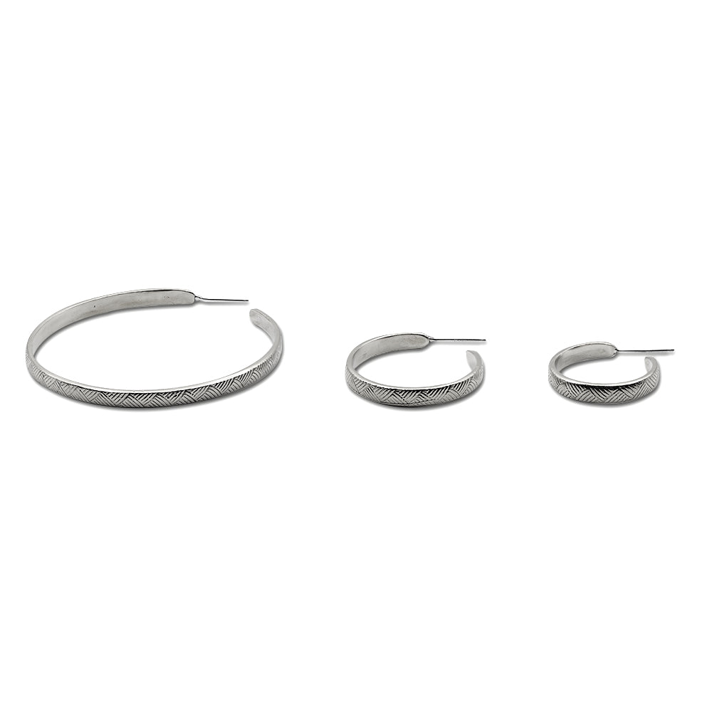 Introducing our vintage-inspired sterling silver hoop earrings, elegantly designed with a graceful curve. Available in small, medium, and large sizes, these hoops offer timeless sophistication and versatility. Handcrafted in solid sterling silver, they are a perfect choice for adding a touch of refined style to any outfit.