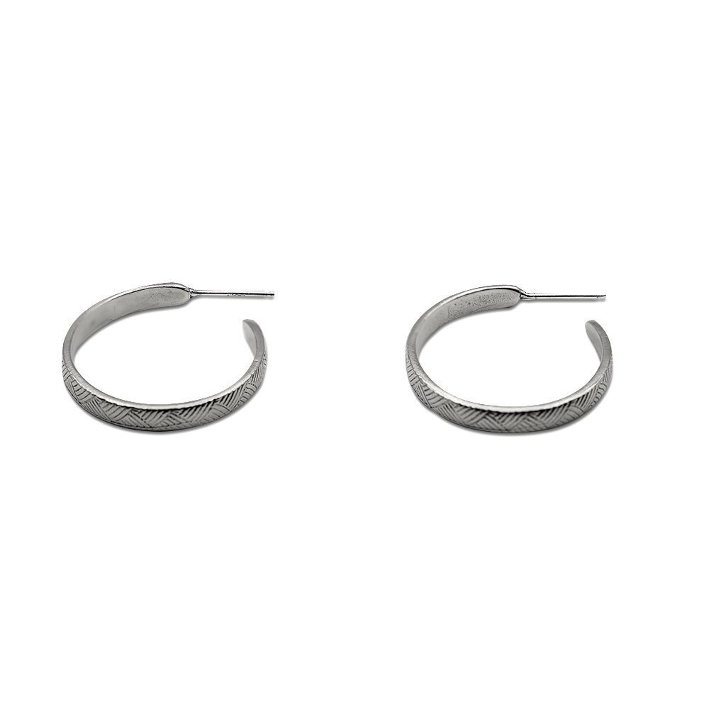 Introducing our vintage-inspired sterling silver hoop earrings, elegantly designed with a graceful curve. Available in small, medium, and large sizes, these hoops offer timeless sophistication and versatility. Handcrafted in solid sterling silver, they are a perfect choice for adding a touch of refined style to any outfit.