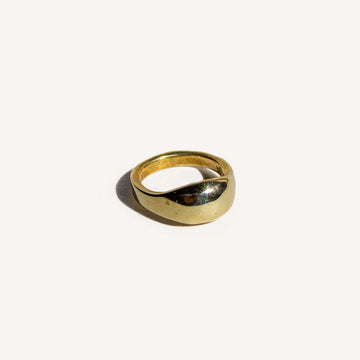 Introducing our elegant Solid 14k Gold Dome Pinky Ring, a refined piece handcrafted in wax with a small oval shape, perfect for your pinky finger. Available in brass or silver and designed in sizes 3-7, this ring embodies a timeless sophistication. Explore the versatility of this uniquely crafted piece that adds a touch of elegance to any style.