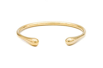 Introducing the Sustainable Gold Cuff Bracelet, cast from seapods found along North Fork shores. Available in Small (5 1/2”) and Medium/Large (6”) sizes, this flexible piece supports marine research. Combining eco-conscious craftsmanship with a commitment to environmental preservation, it offers a unique, timeless addition to any collection.