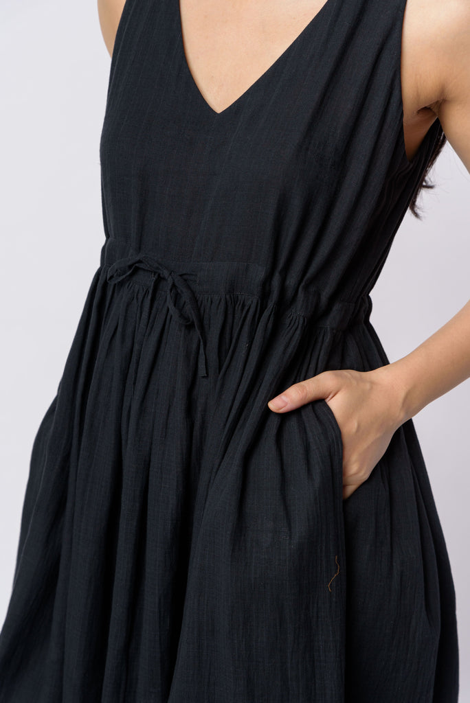 Black front tie-up dress, best sustainable women's clothing, clothing brands sustainable, organic jackets women's, women's organic dresses, cotton clothing website, organic cotton women's clothing, organic women's shirts, women's natural fiber clothing, minimal online shop, minimal store online
