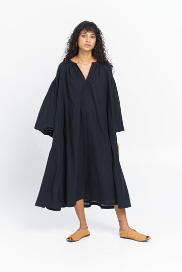 Free flowing relaxed midi dress, sustainable women's clothing, sustainable women's fashion, organic clothing, organic cotton ladies clothing, cotton com clothing, cotton dress clothes, organic women's clothing, women's cotton clothing brands, minimal clothing brands, minimalist clothing shop