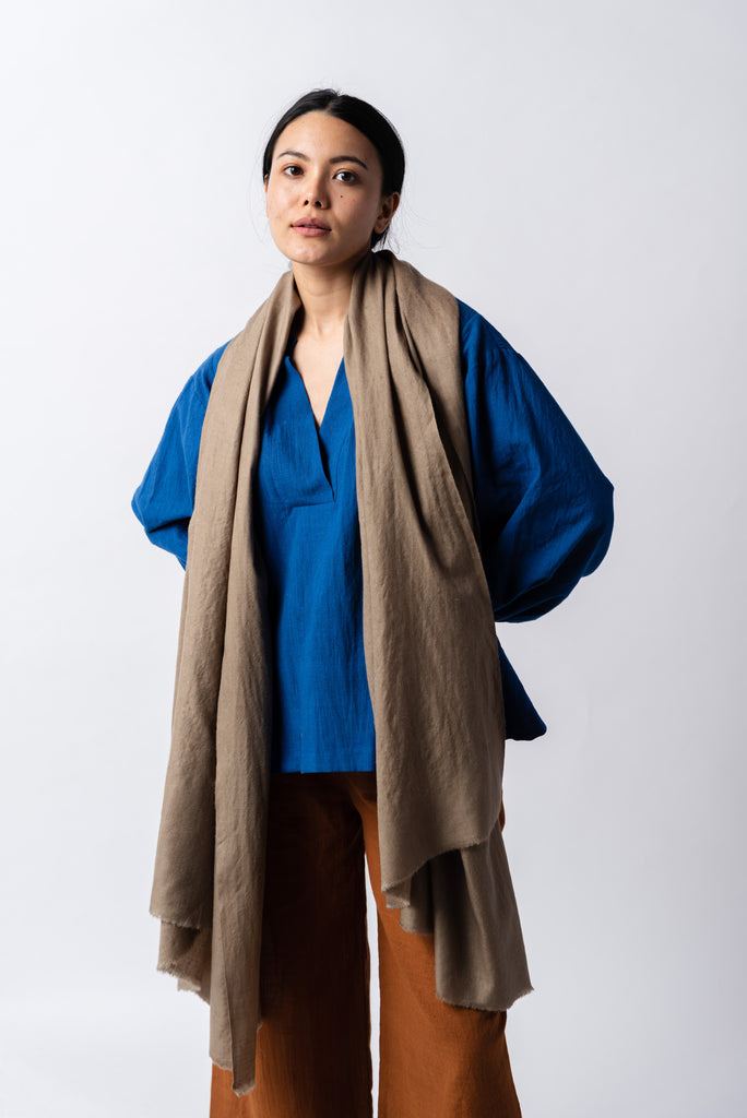 How-to-style-your-winter-outfits-in-a-sophisticated-way-worldwide-Khaki-solid-pashmina-stole